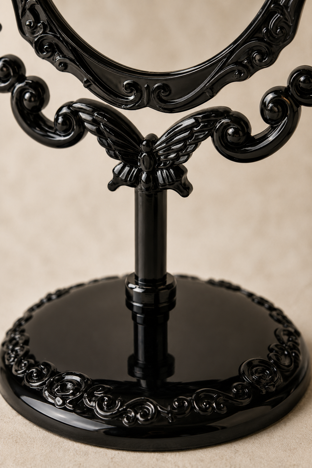 Miroir coiffeuse papillon, noir 22×16 cm. Détail du cadre en gros plan.