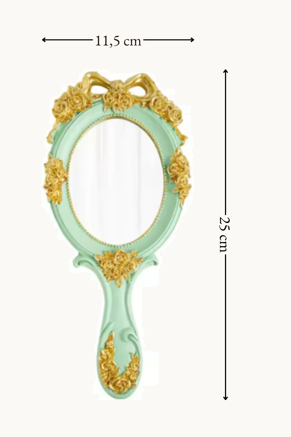 Miroir à main baroque roses dorées 11,5×25 cm, Roses en relief dorées sur fond teinté. Installé dans un intérieur habité.