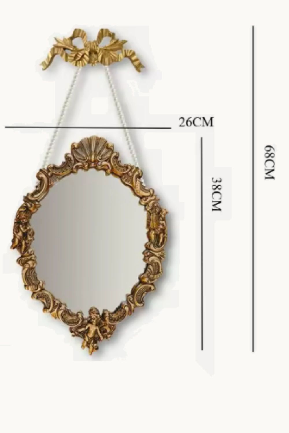 Ovale baroque doré à angelots 26×38 cm, Doré antique brossé. Installé dans un intérieur habité.